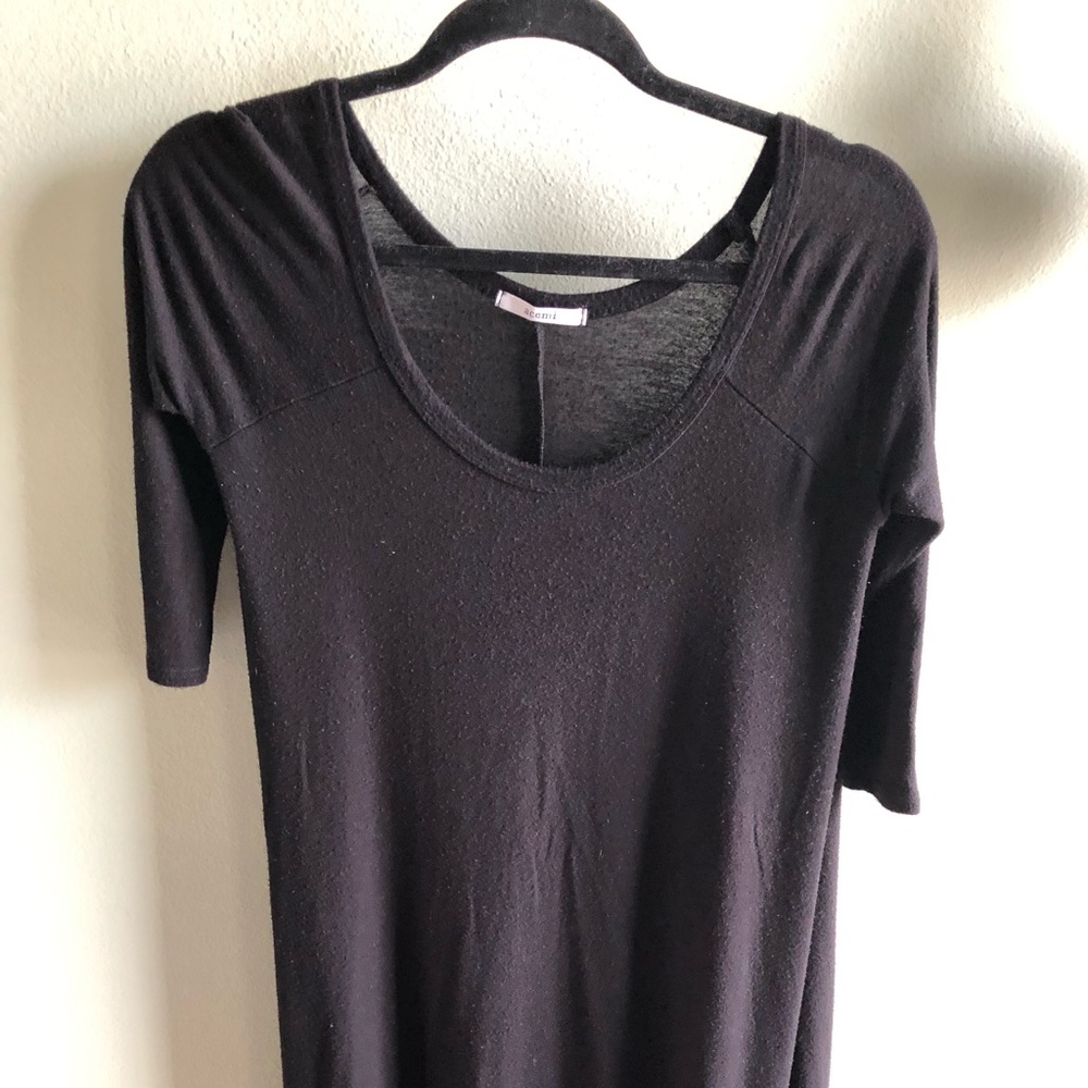 Black shirt. Long and flows